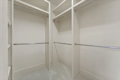 a view of an empty walk in closet