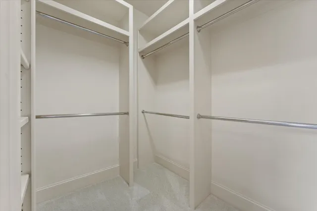 a view of an empty walk in closet