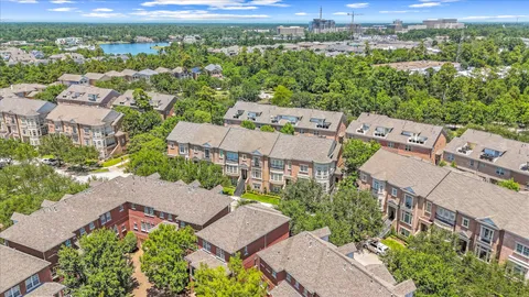 an aerial view of a house with a garden