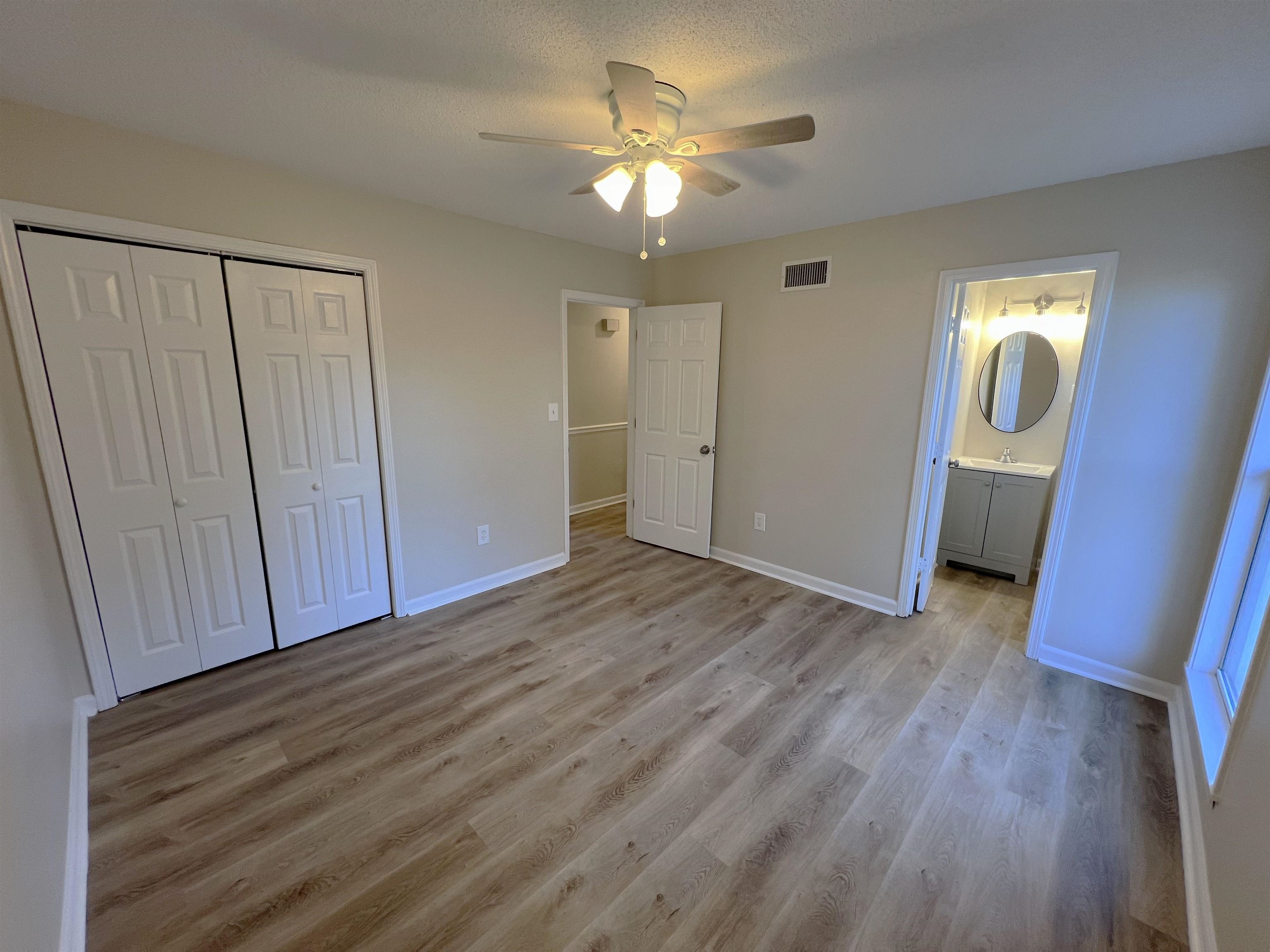 993 Poplar Leaf Road Collierville, TN 38017 - Photo 13 of 20 a view of empty room with wooden floor