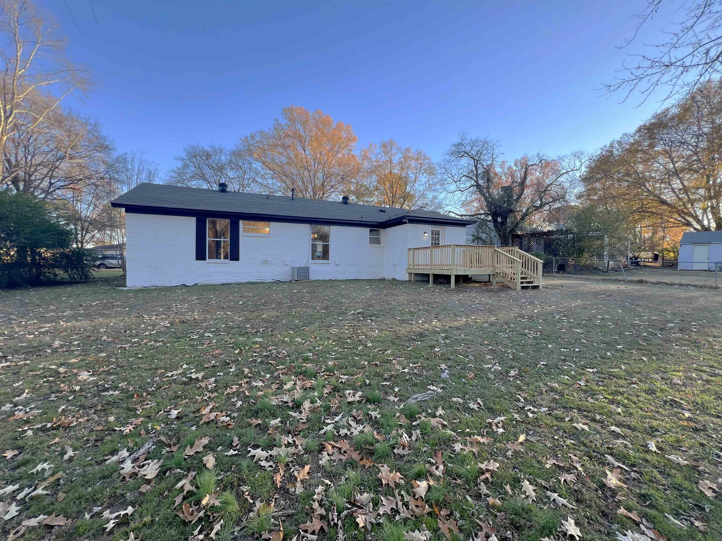993 Poplar Leaf Road Collierville, TN 38017 - Photo 18 of 20 a white house that has a tree in front of it