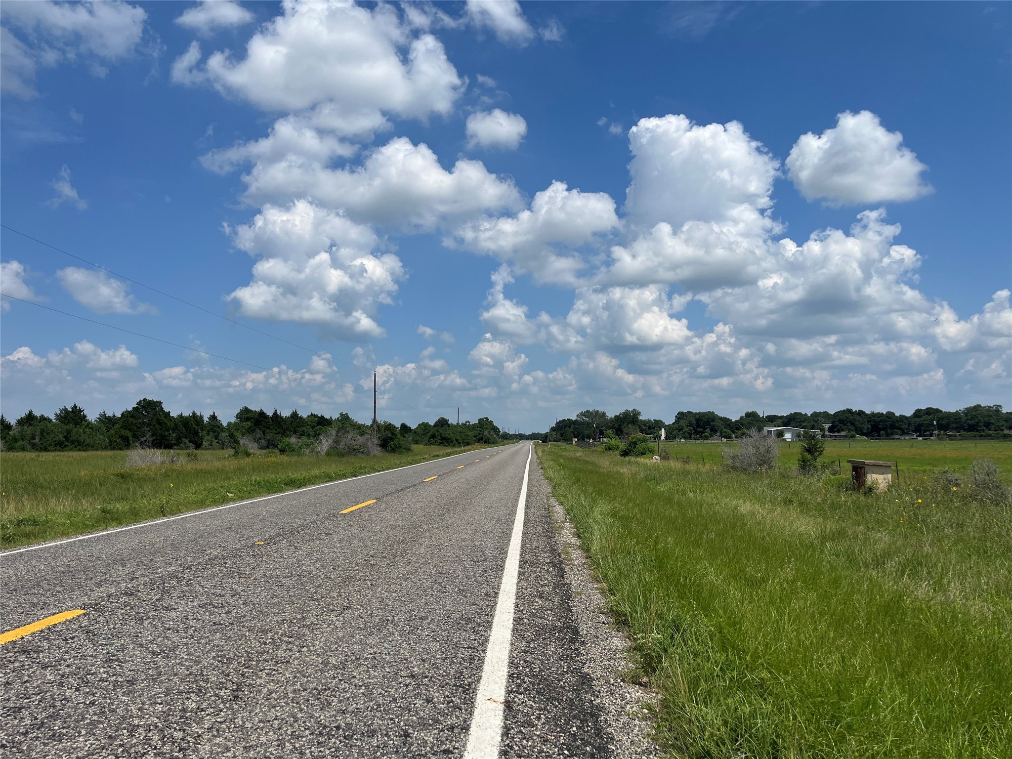 3575 Fm 1094 Road Sealy, TX 77474 - Photo 7 of 17 a view of a golf course with a lake
