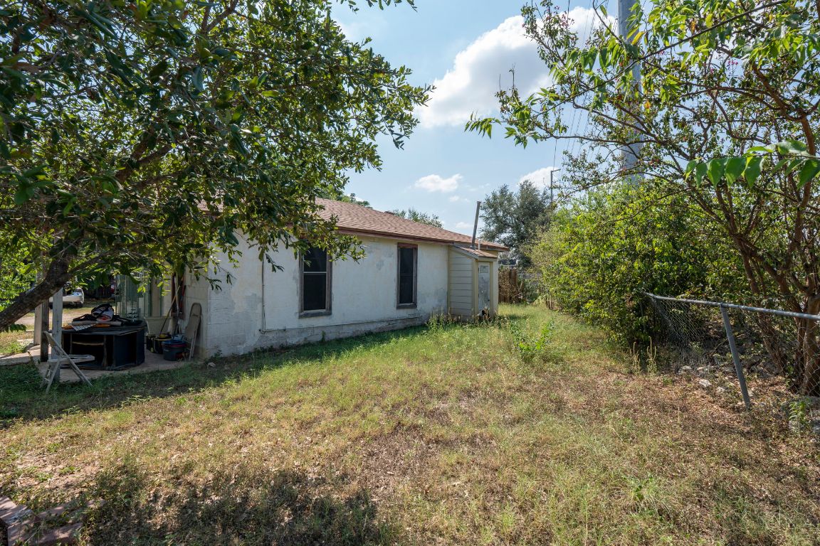 4801 Lott Avenue Austin, TX 78721 - Photo 11 of 20 a backyard of a house with lots of green space