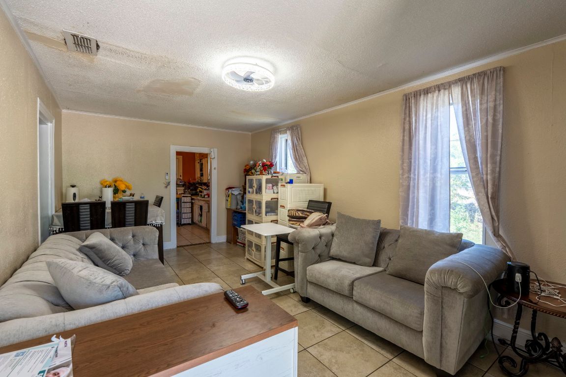 4801 Lott Avenue Austin, TX 78721 - Photo 2 of 20 a living room with furniture and a large window
