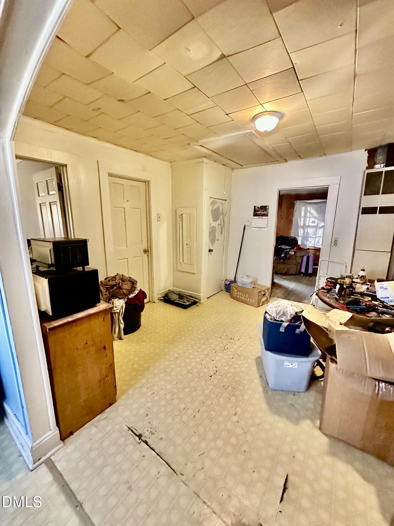 142 Yarborough Street Roxboro, NC 27573 - Photo 7 of 12 a bedroom with furniture and a bed