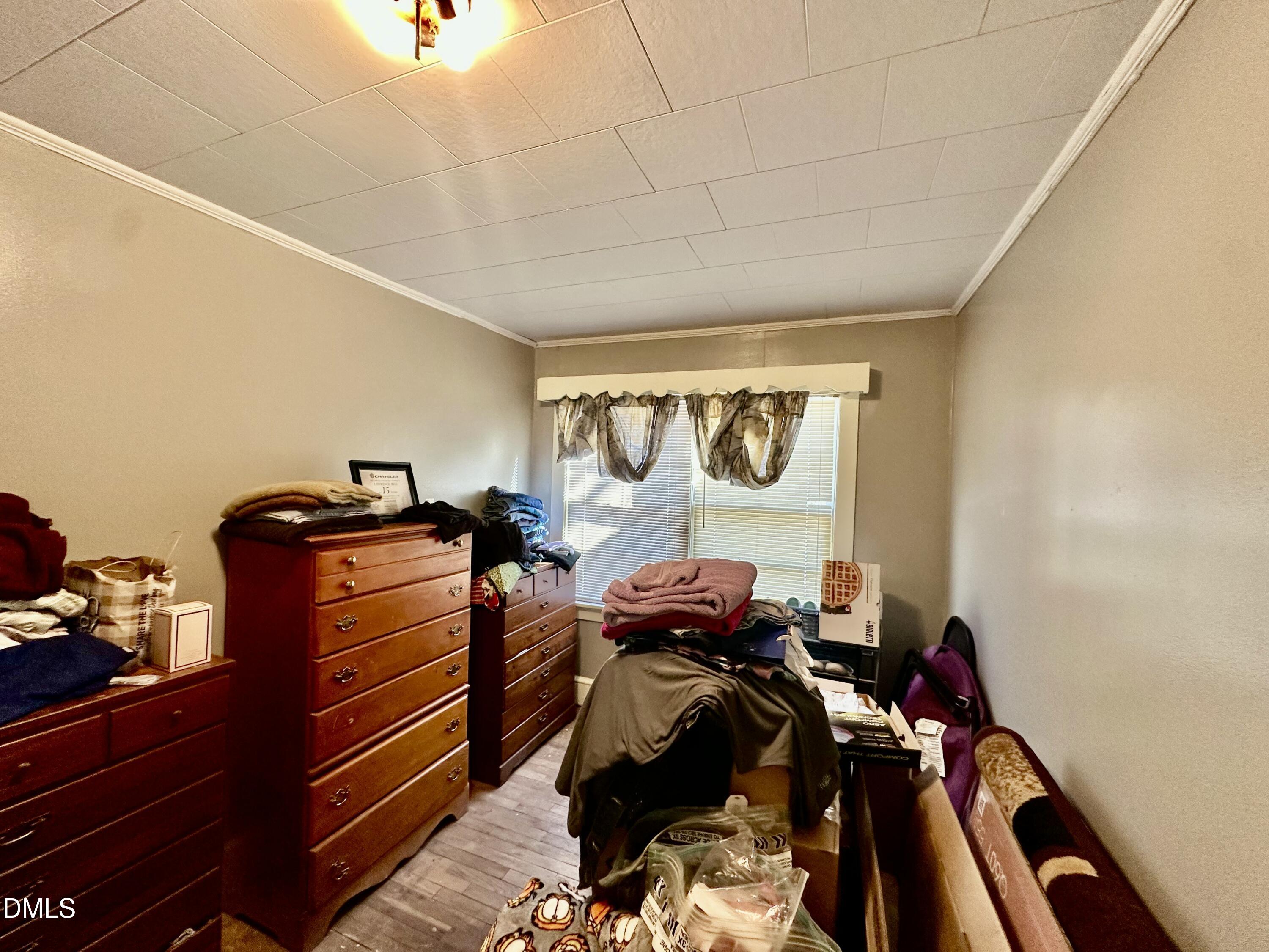 142 Yarborough Street Roxboro, NC 27573 - Photo 8 of 12 a room with gym equipment