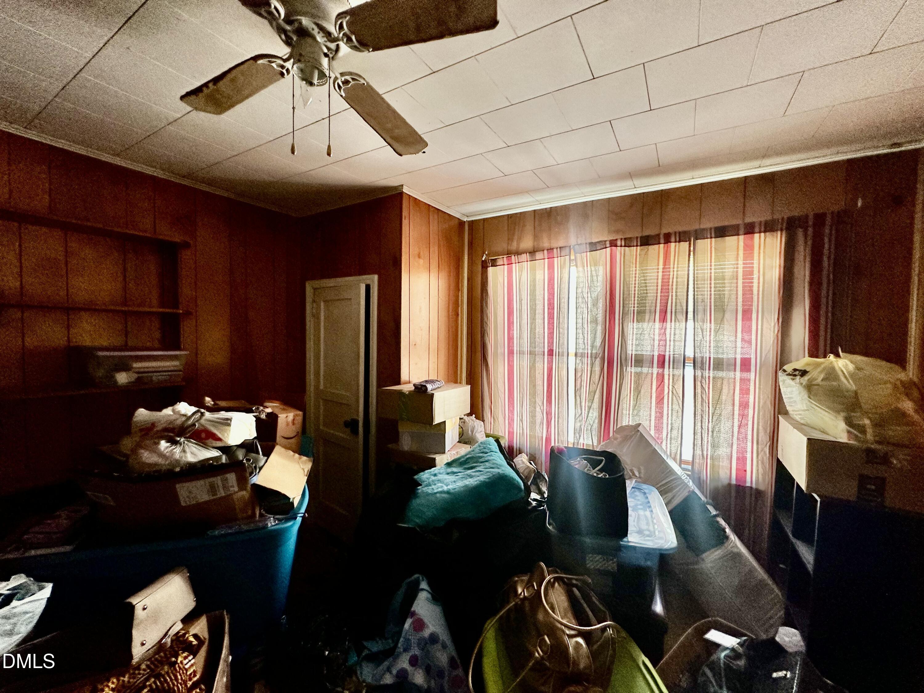 142 Yarborough Street Roxboro, NC 27573 - Photo 9 of 12 a living room with furniture and a window