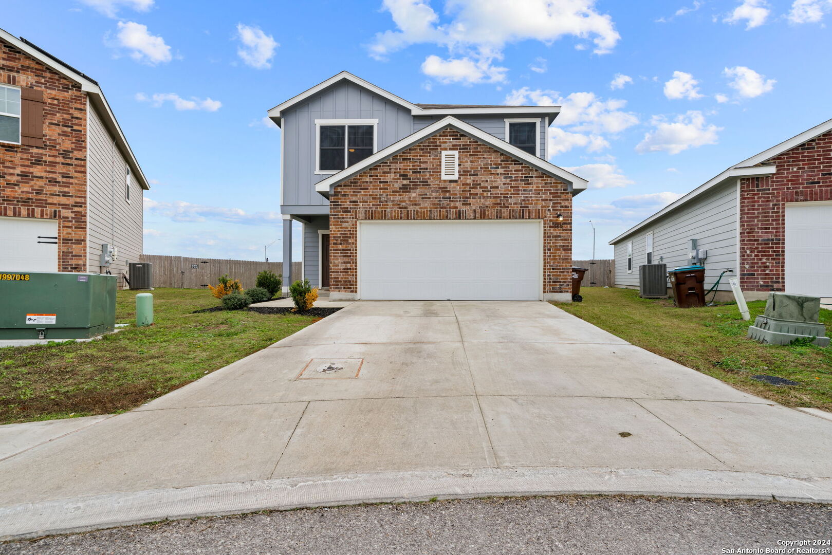 5818 Gulf Meadow Converse, TX 78109 - Photo 1 of 1 a front view of a house with a yard and garage