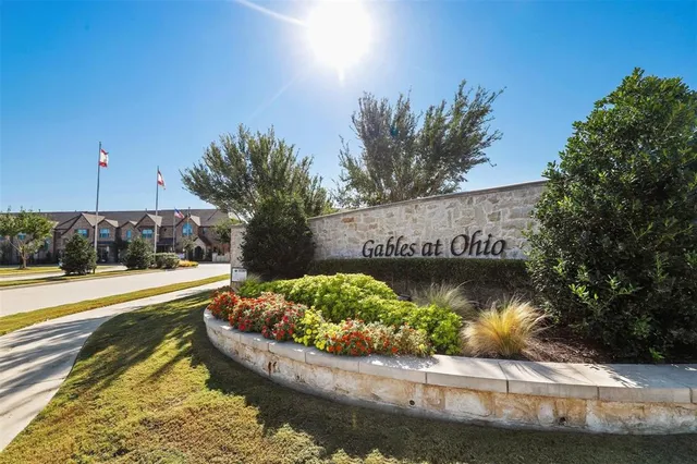 a view of a swimming pool with an outdoor space and seating area