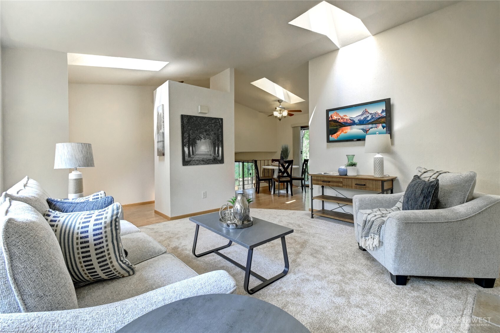 1106 South 23rd Street Renton, WA 98055 - Photo 5 of 32 a living room with furniture and a flat screen tv