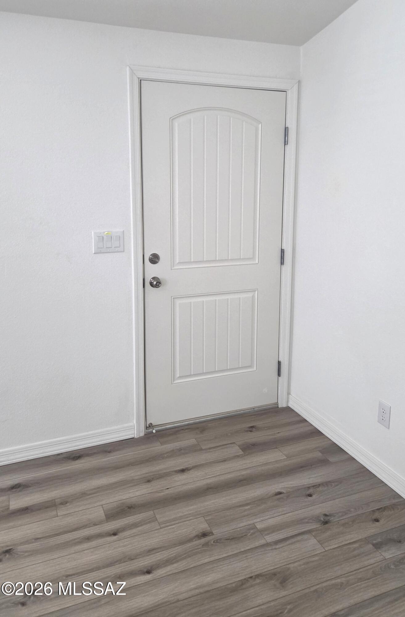 1030 Barrel Cactus Ridge, Unit 118 Benson, AZ 85602 - Photo 9 of 22 a view of wooden floor