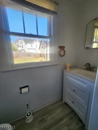 a view of a storage and utility room with a window