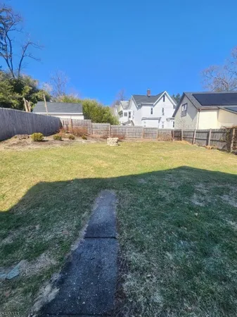 a house view with a swimming pool