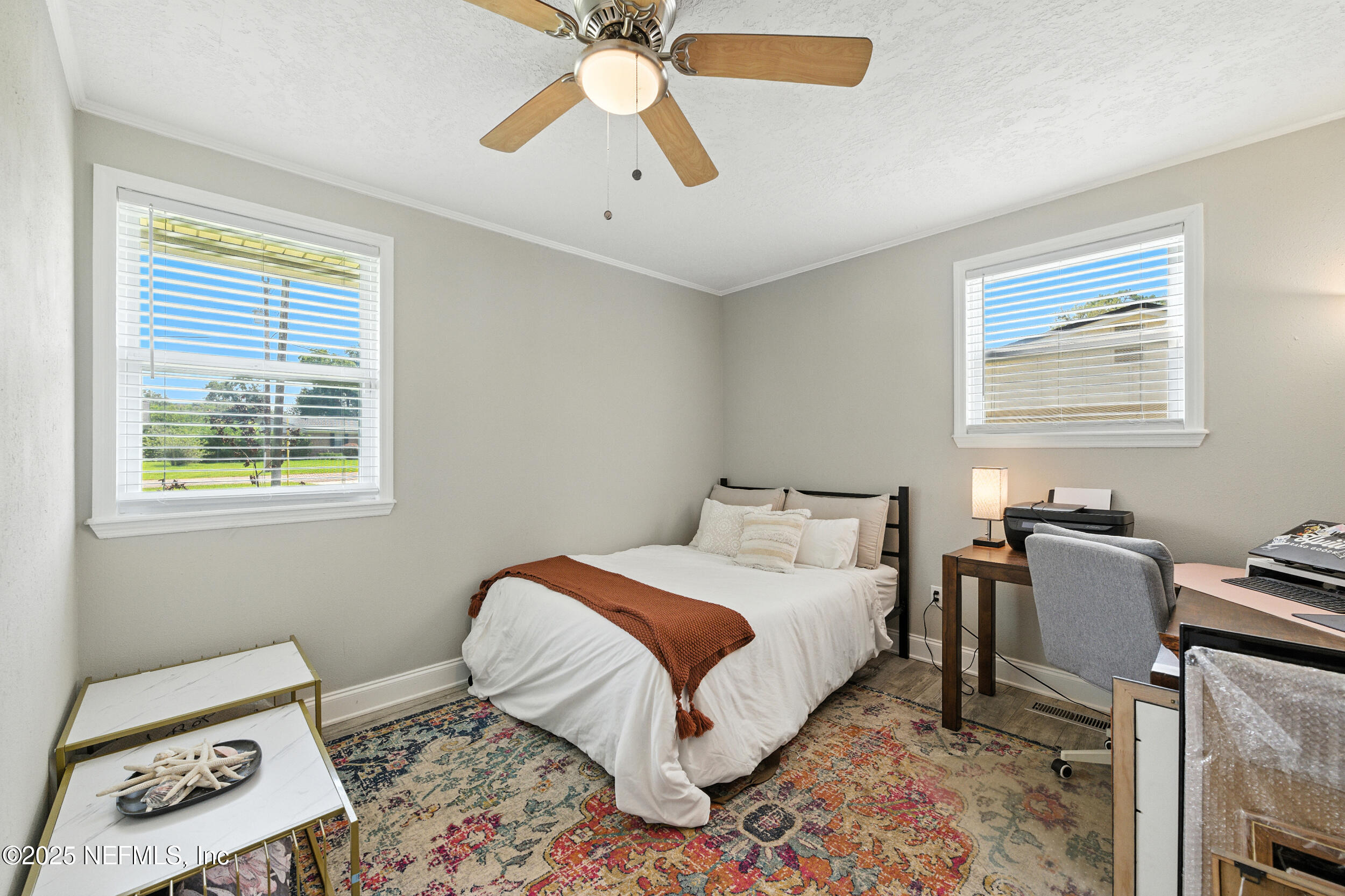 706 Estates Cove Road Jacksonville, FL 32221 - Photo 16 of 26 a bedroom with a bed and a window