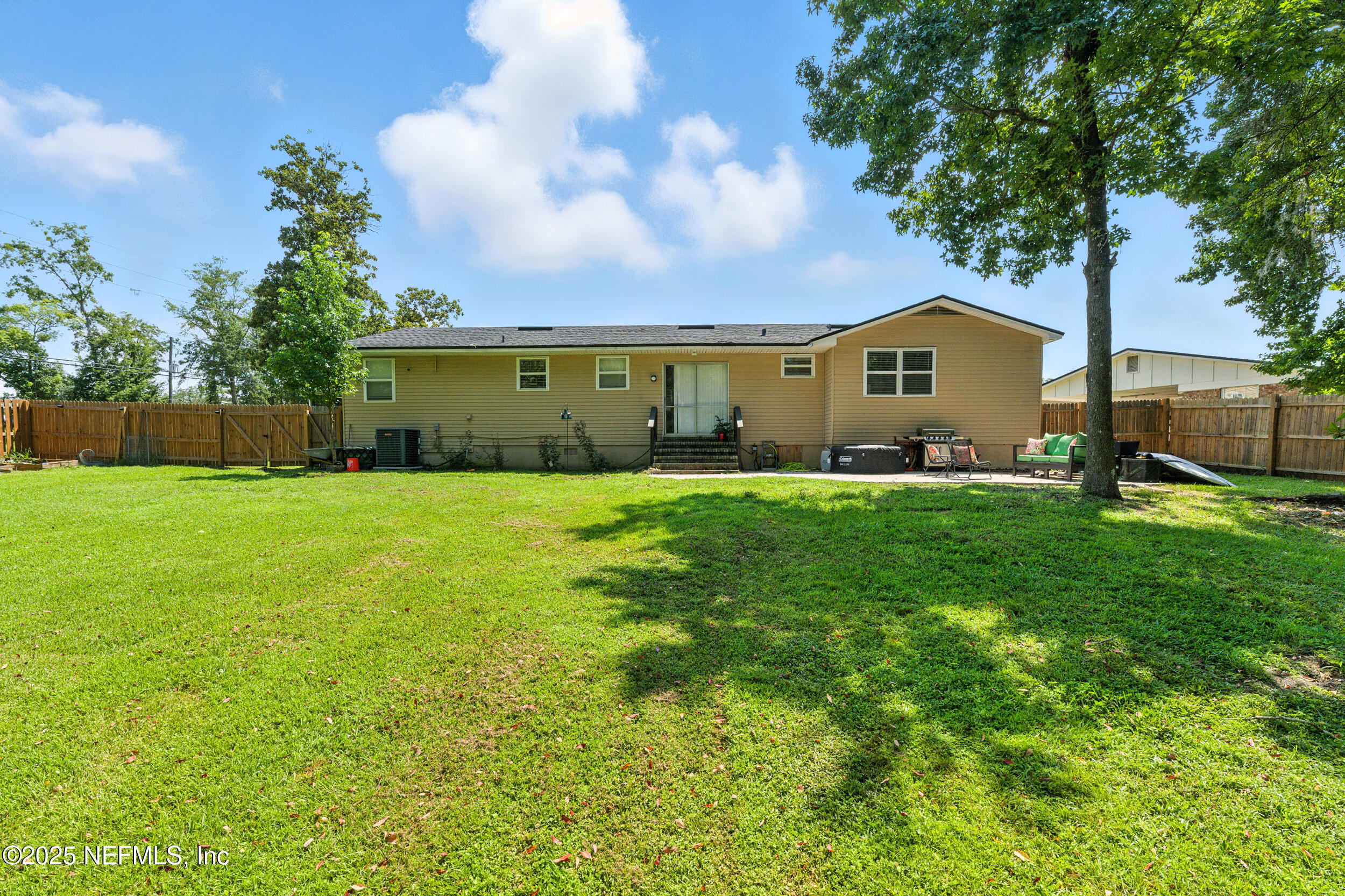 706 Estates Cove Road Jacksonville, FL 32221 - Photo 21 of 26 a large house with a garden