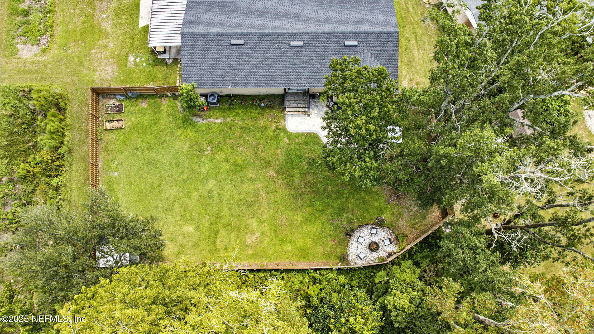 706 Estates Cove Road Jacksonville, FL 32221 - Photo 3 of 26 a view of a garden with a bench