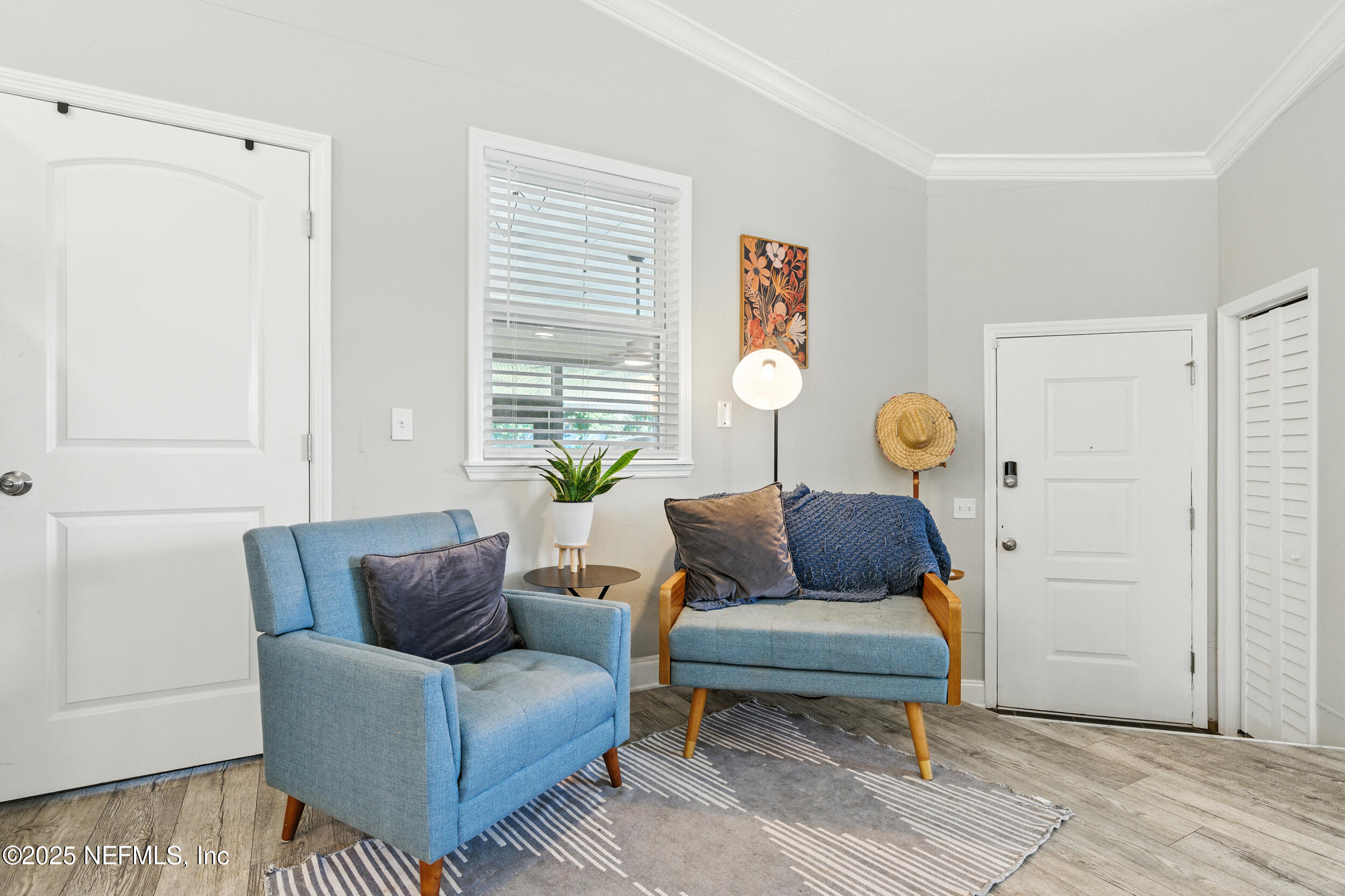 706 Estates Cove Road Jacksonville, FL 32221 - Photo 5 of 26 a living room with furniture and a window