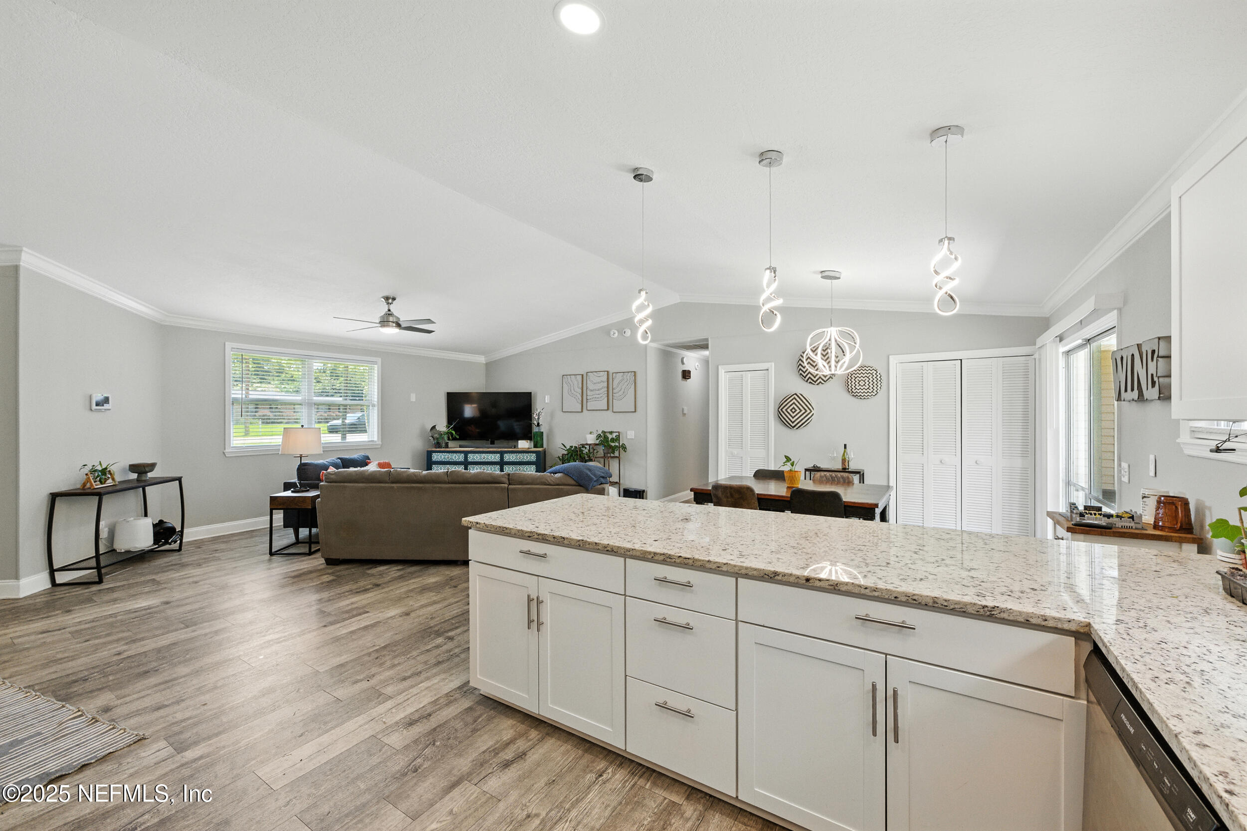 706 Estates Cove Road Jacksonville, FL 32221 - Photo 10 of 26 a large white kitchen with a large window