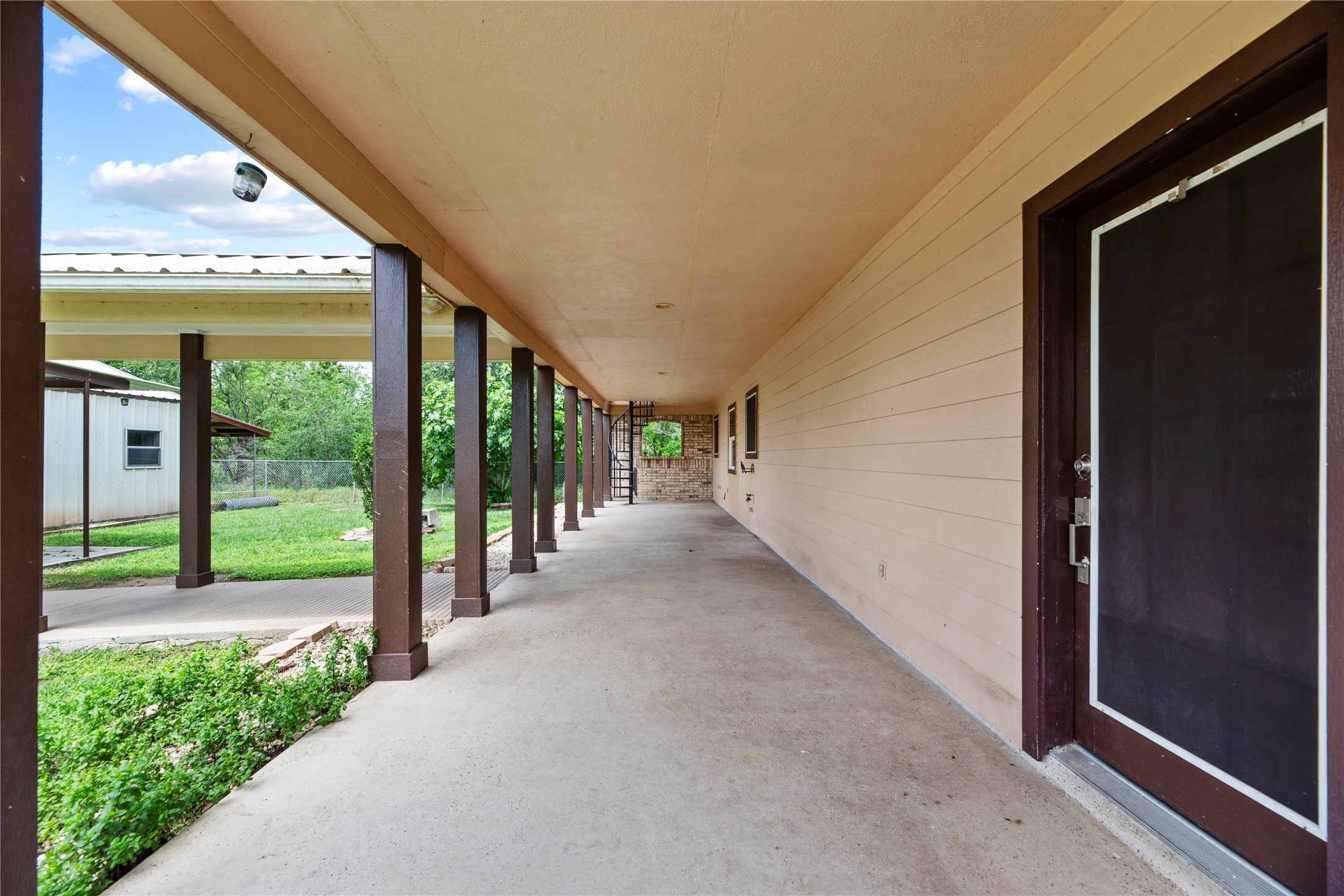 523 Moore Bar Road Rosenberg, TX 77471 - Photo 16 of 50 Full length covered back patio.
