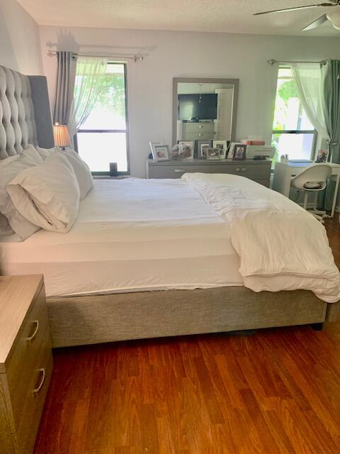9256 Sable Ridge Circle, Unit B Boca Raton, FL 33428 - Photo 12 of 21 a bedroom with a bed and window