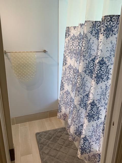 9256 Sable Ridge Circle, Unit B Boca Raton, FL 33428 - Photo 15 of 21 a bathroom with a shower