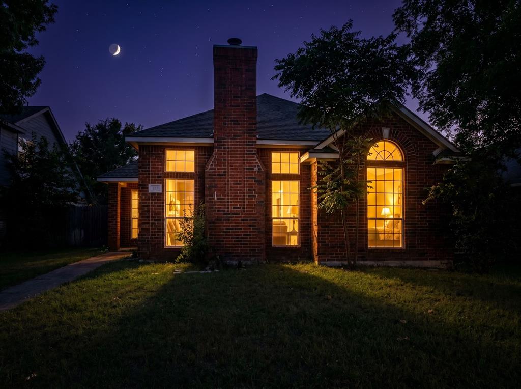 3721 Smartt Street Rowlett, TX 75088 - Photo 26 of 27 a house view with a garden space
