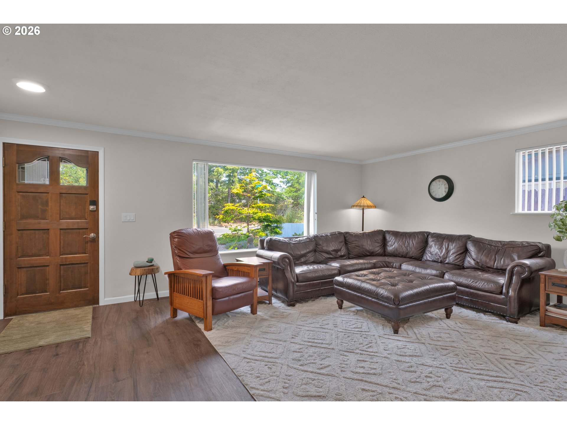 1142 9th Street Florence, OR 97439 - Photo 7 of 41 a living room with furniture and a window
