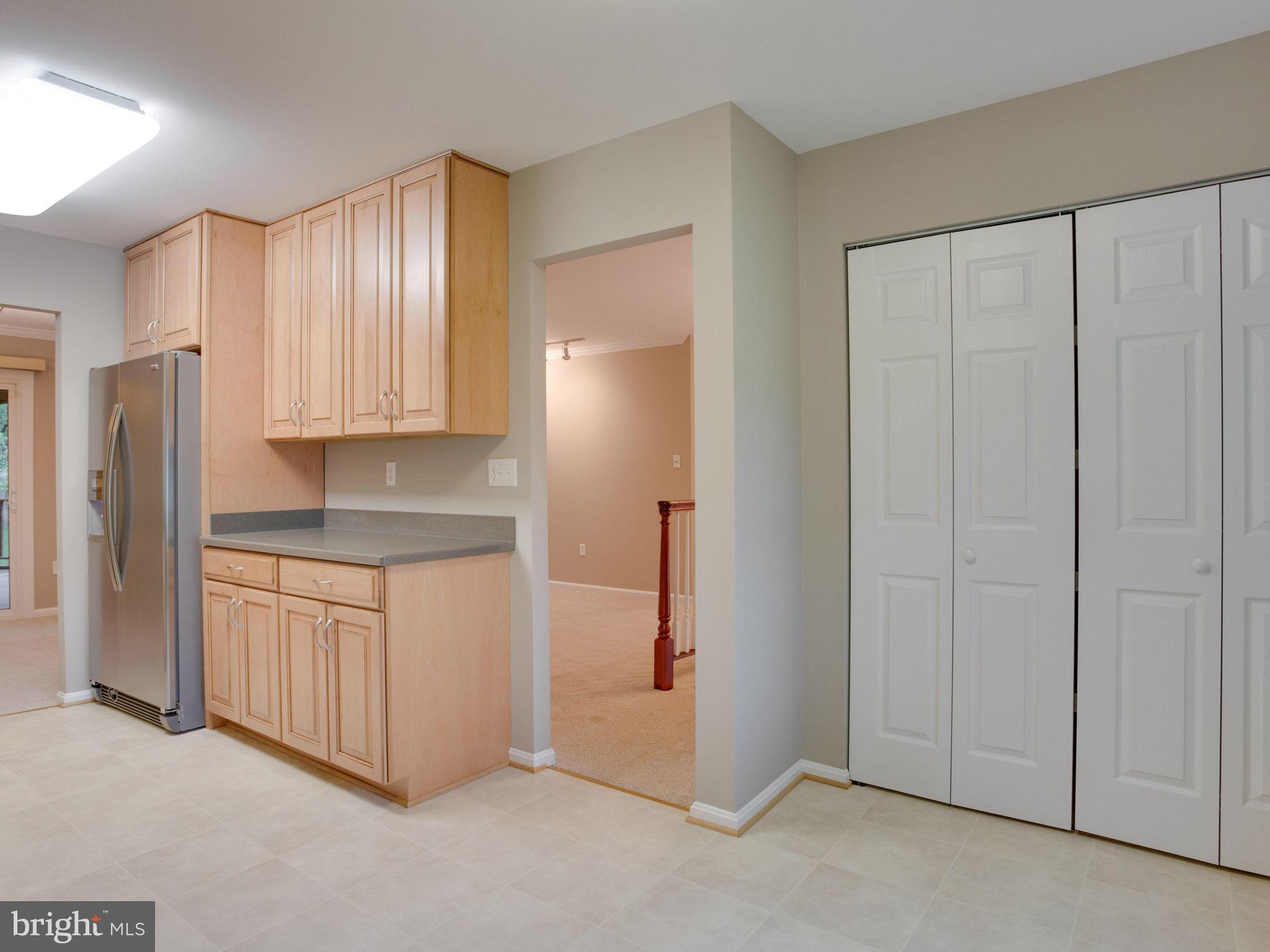 2323 Archdale Road Reston, VA 20191 - Photo 12 of 30 a view of a kitchen with cabinets