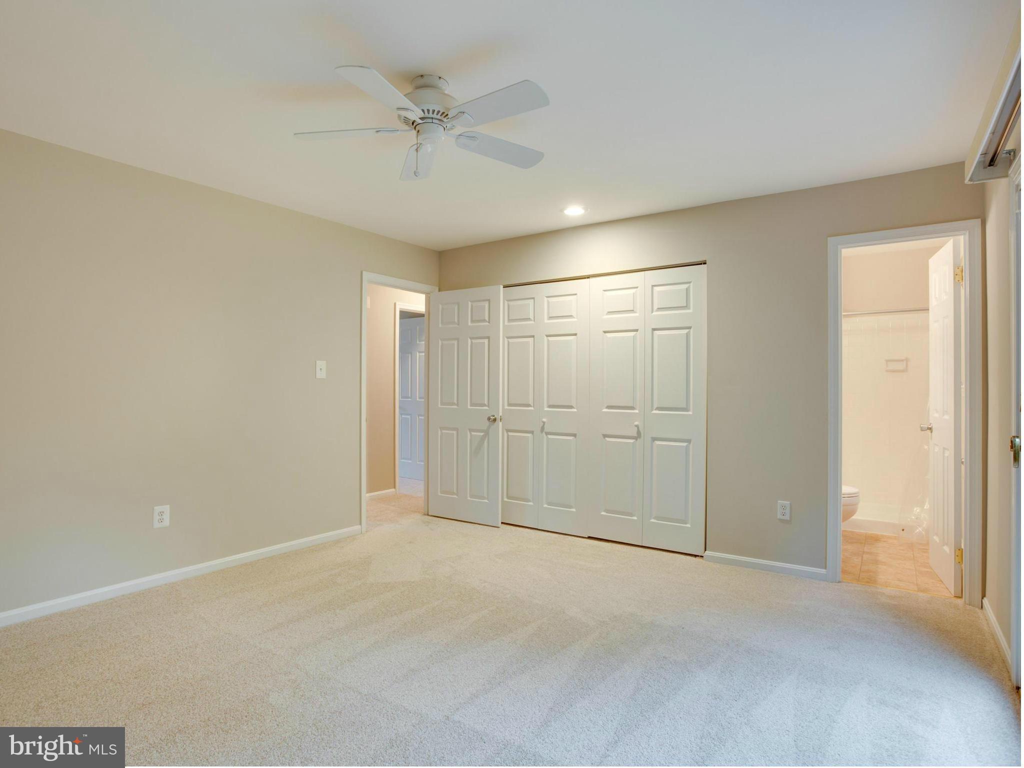 2323 Archdale Road Reston, VA 20191 - Photo 13 of 30 an empty room with a empty space and a ceiling fan