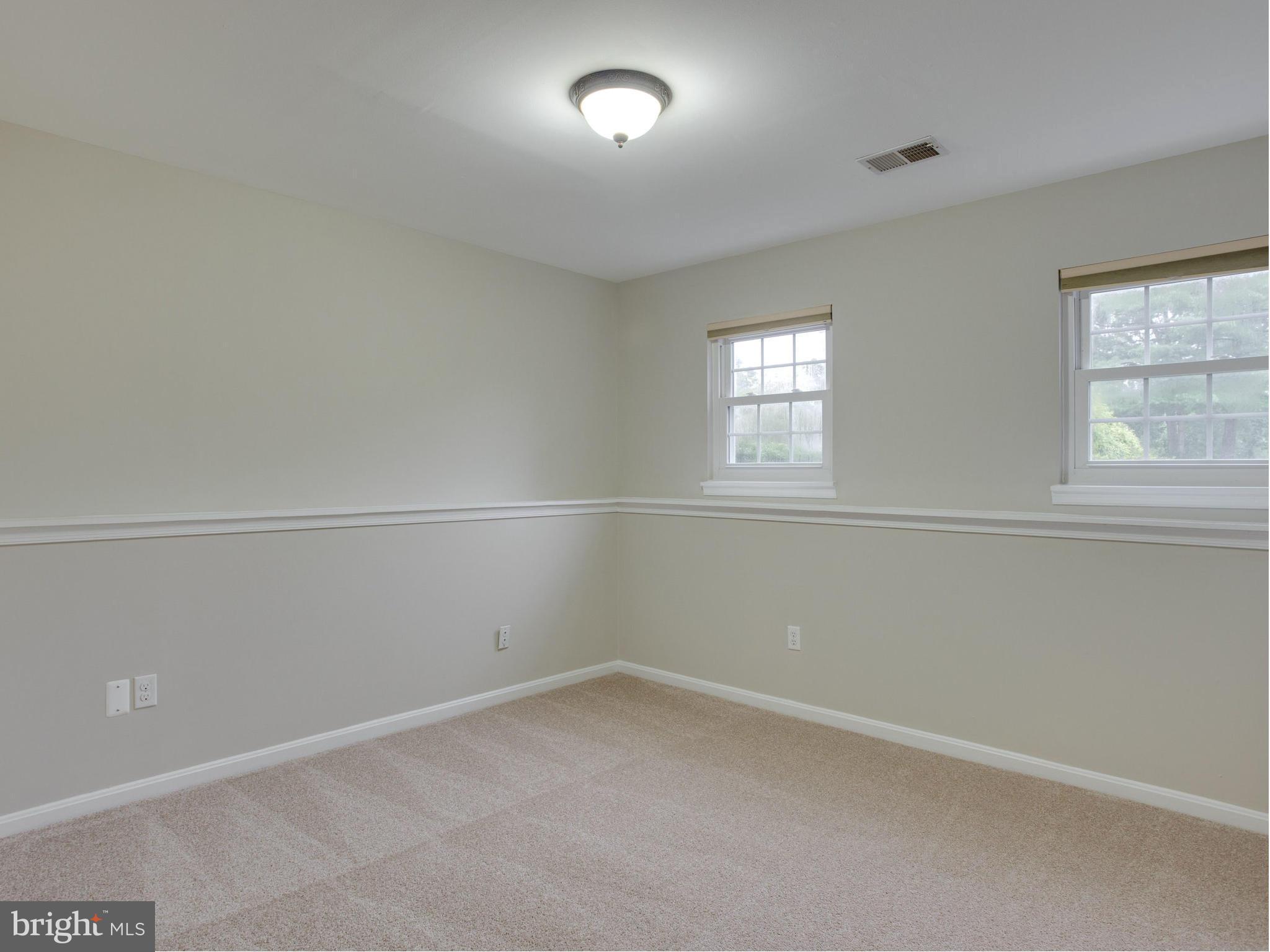 2323 Archdale Road Reston, VA 20191 - Photo 21 of 30 an empty room with windows
