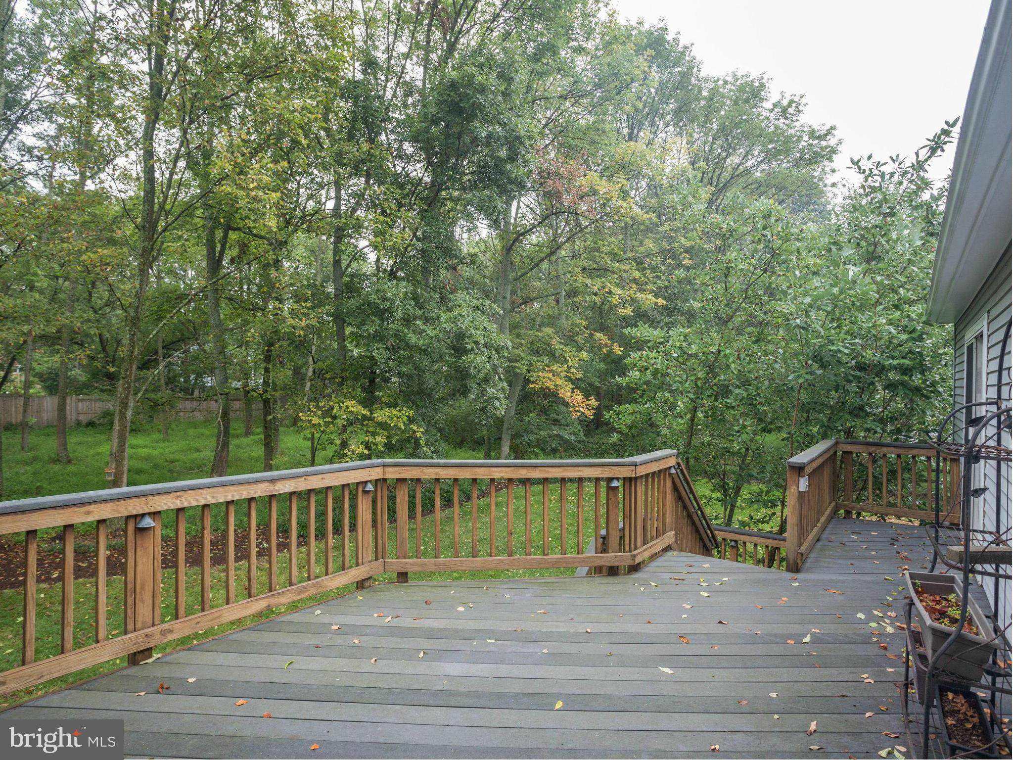2323 Archdale Road Reston, VA 20191 - Photo 24 of 30 a view of a wooden deck and a yard