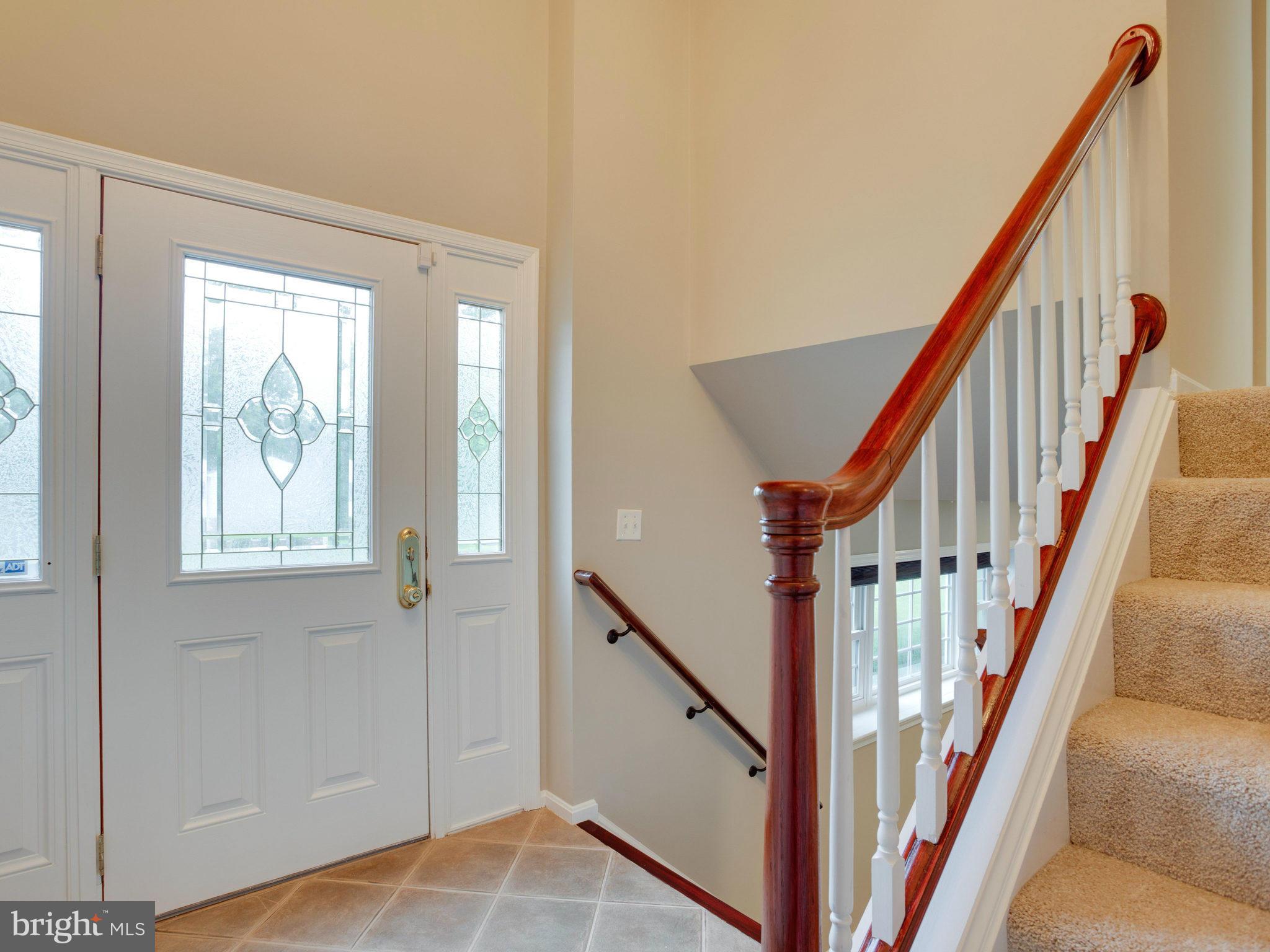 2323 Archdale Road Reston, VA 20191 - Photo 5 of 30 a view of an entryway with staircase