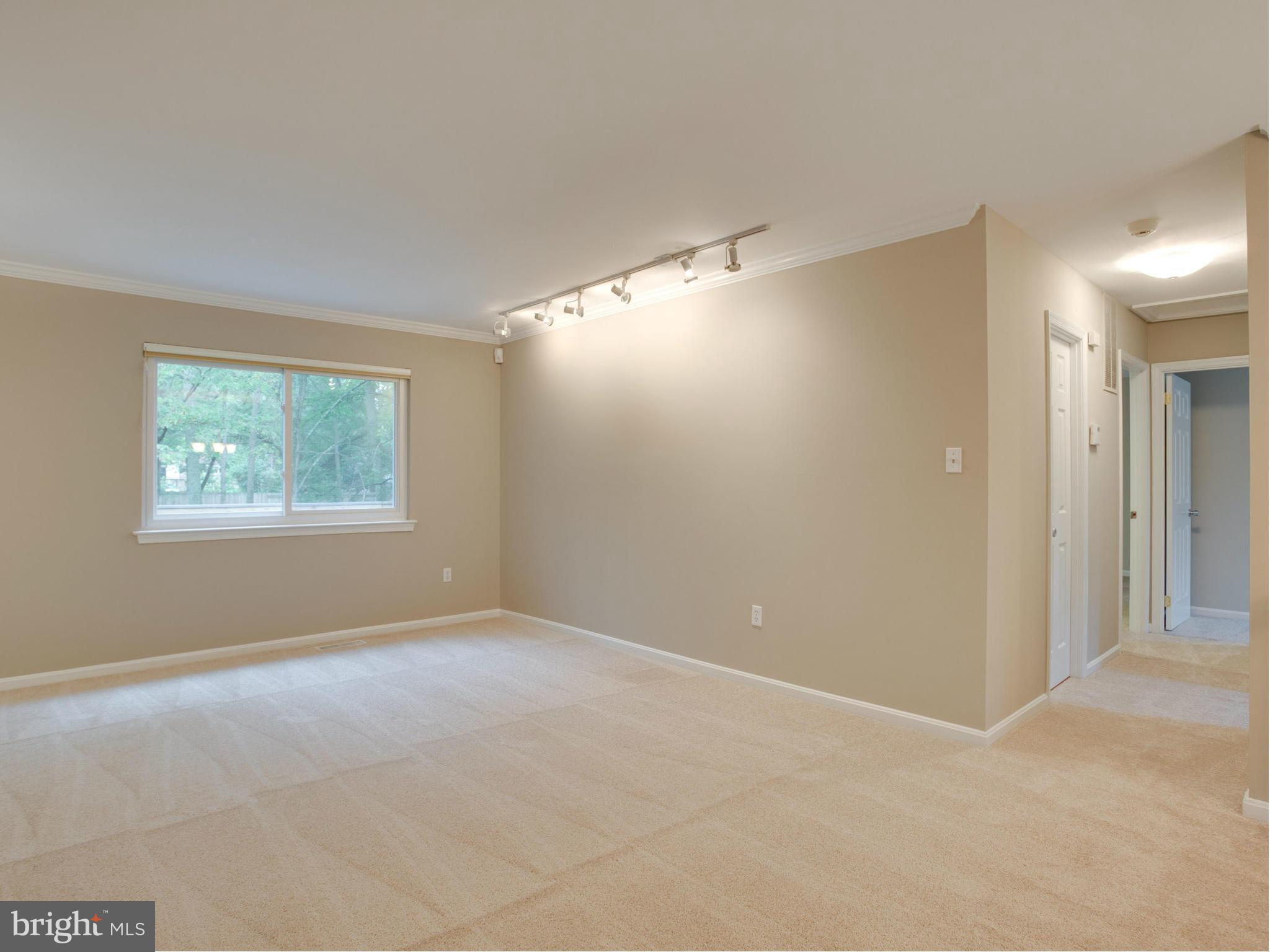 2323 Archdale Road Reston, VA 20191 - Photo 7 of 30 an empty room with windows and closet