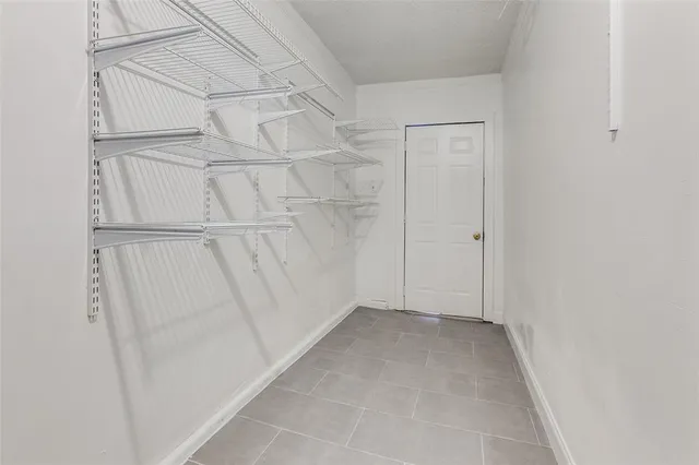 a view of an empty walk in closet