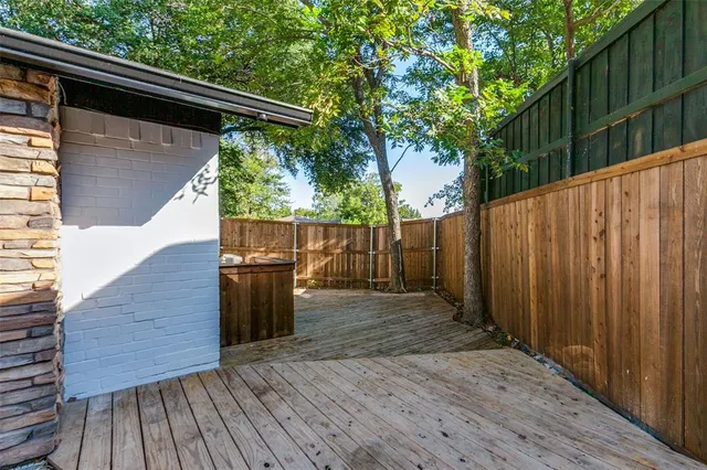 a view of outdoor space with deck and wooden floor