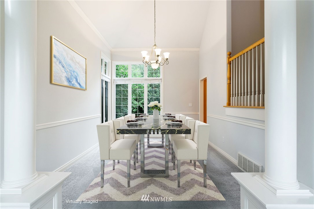 2411 201st Street Southeast Bothell, WA 98021 - Photo 5 of 24 a view of a dining room with furniture window and outside view