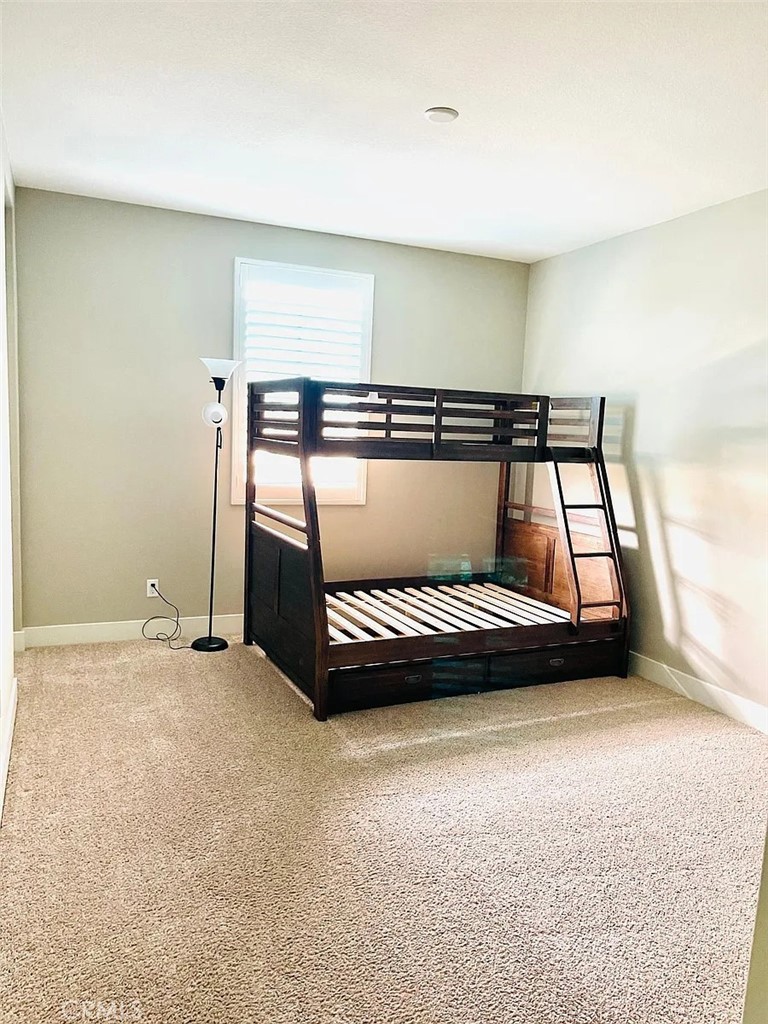 5177 Pomona Rincon Road Eastvale, CA 92880 - Photo 15 of 25 a view of car parking