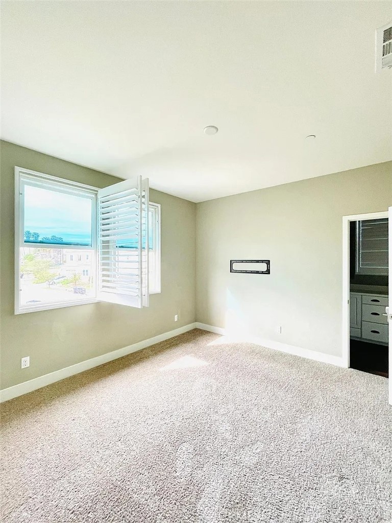 5177 Pomona Rincon Road Eastvale, CA 92880 - Photo 16 of 25 a view of an empty room with a window