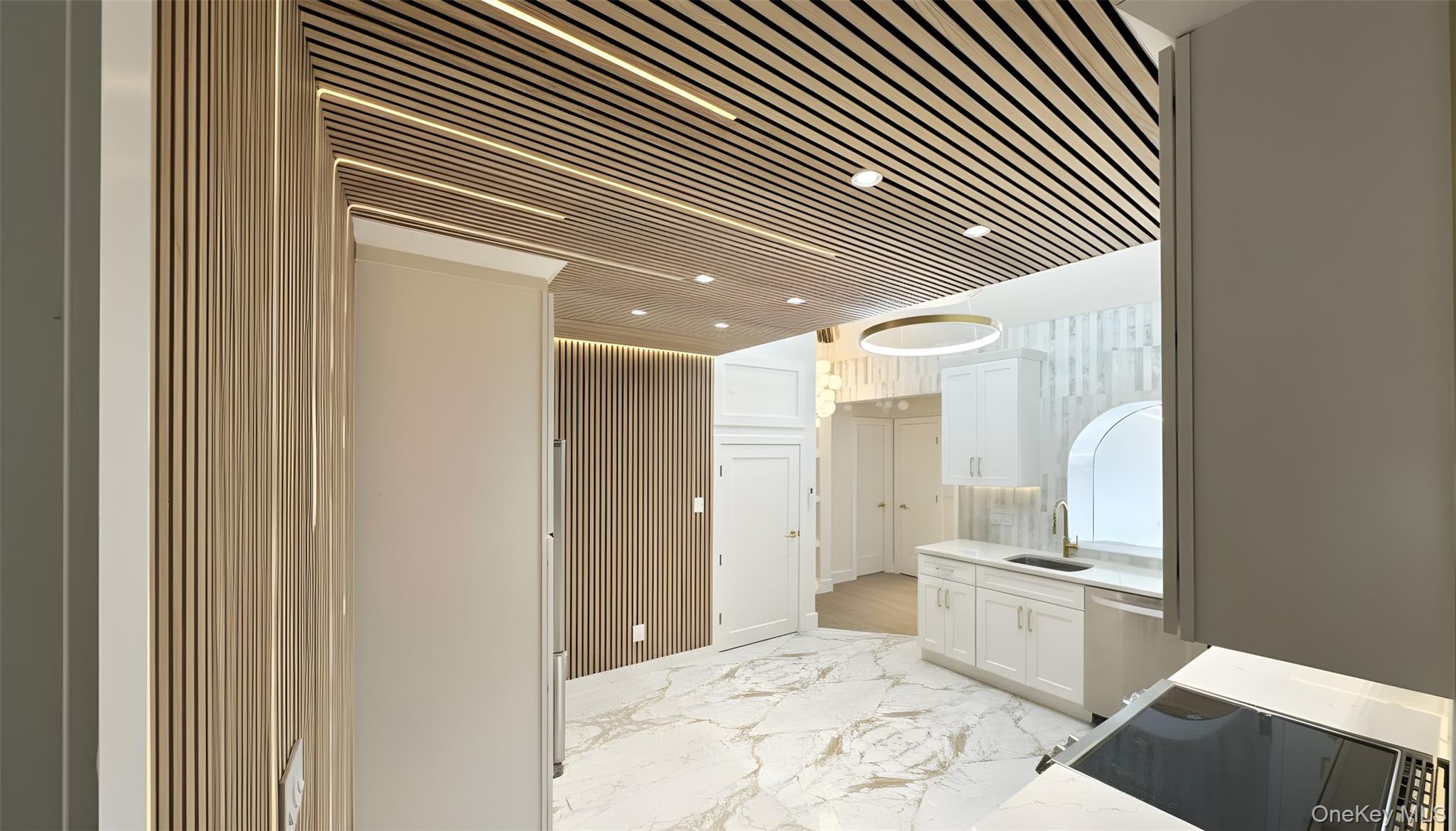 504 Gazzola Drive, Unit A East Patchogue, NY 11772 - Photo 6 of 13 a bathroom with a sink and a mirror