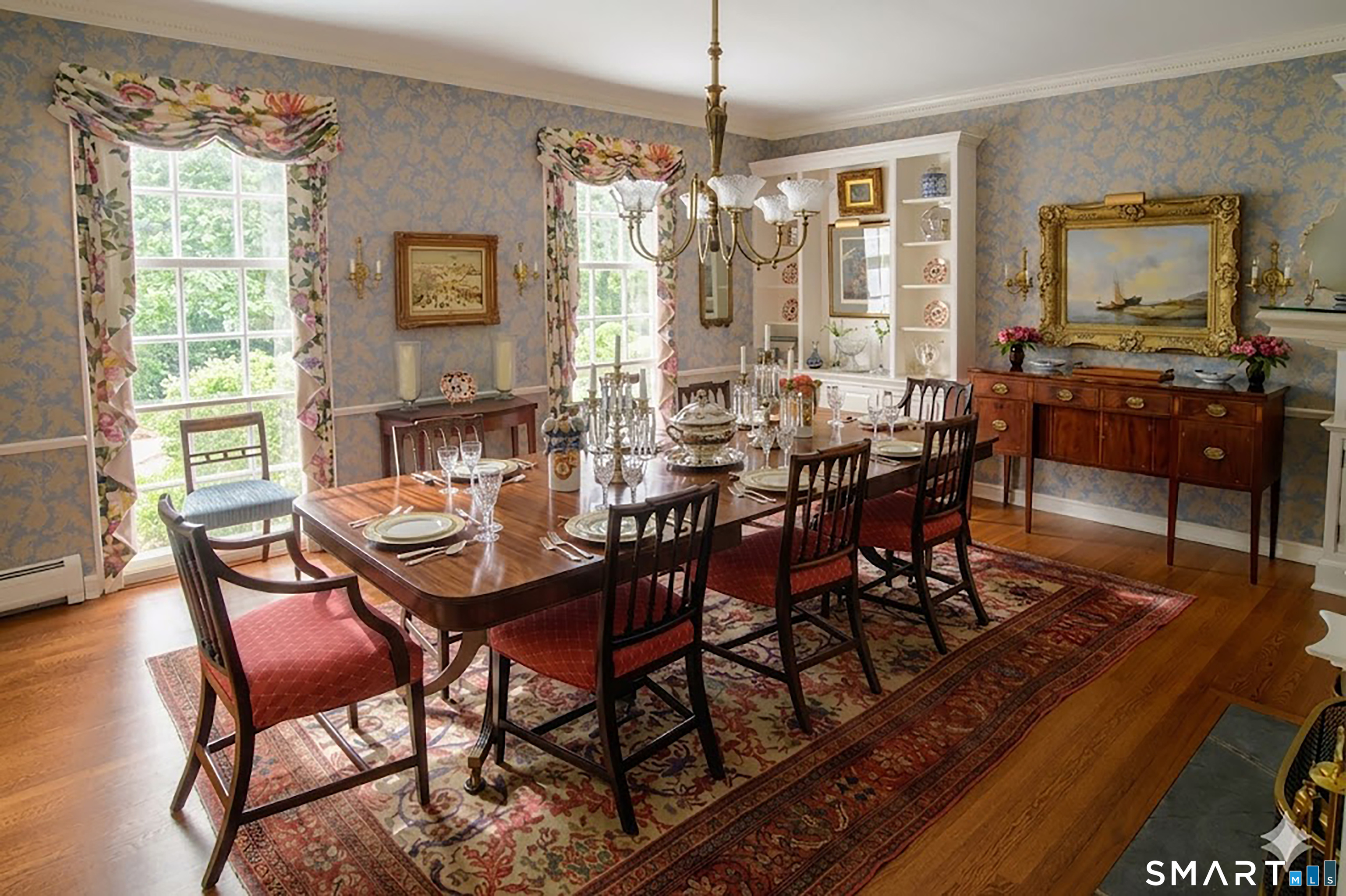 1 Great Elm Road Sharon, CT 06069 - Photo 20 of 39 The light-filled, spacious dining room with a beautiful fireplace, offers oversized triple sash windows measuring 8'2" X 3' and is filled with charm.