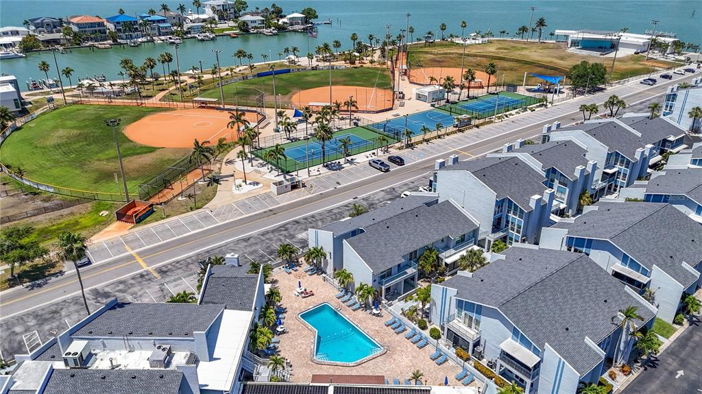 155 Medallion Boulevard, Unit E Madeira Beach, FL 33708 - Photo 24 of 33 an aerial view of a city