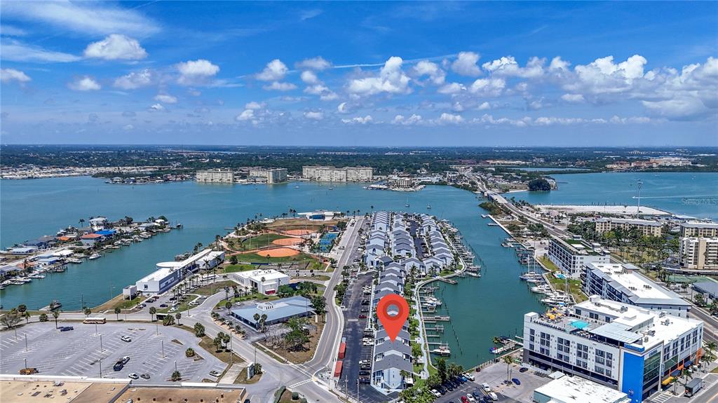 155 Medallion Boulevard, Unit E Madeira Beach, FL 33708 - Photo 28 of 33 an aerial view of a city