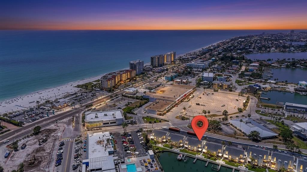 155 Medallion Boulevard, Unit E Madeira Beach, FL 33708 - Photo 31 of 33 an aerial view of a city