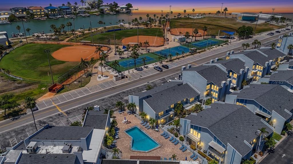 155 Medallion Boulevard, Unit E Madeira Beach, FL 33708 - Photo 33 of 33 an aerial view of a city