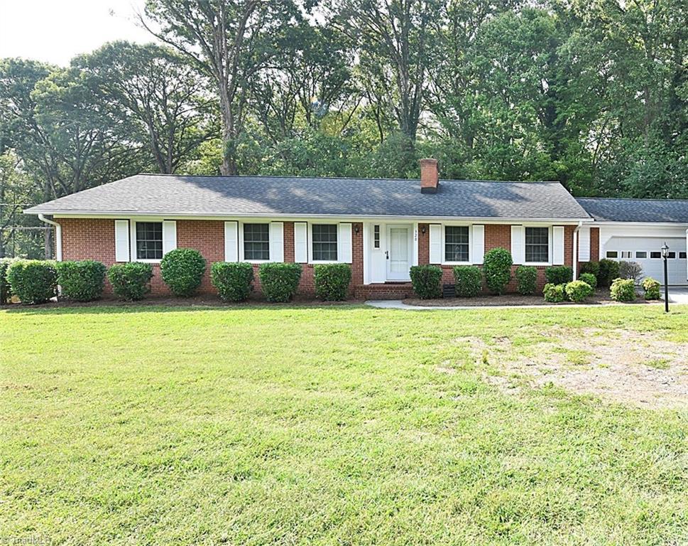 Newer ROOF, GUTTERS, HEAT PUMP, WINDOWS, WATER HEATER, SMOOTH CEILINGS....2 car garage just steps into kitchen....secondary basement garage for yard tools and storage