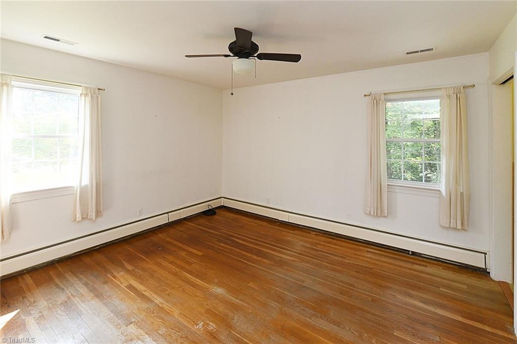 320 Doub Road Lewisville, NC 27023 - Photo 14 of 26 Nice large third bedroom with solid hardwood floors and built ins