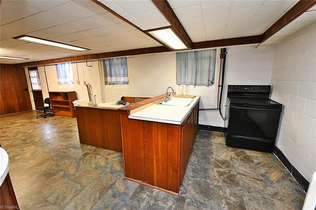 320 Doub Road Lewisville, NC 27023 - Photo 21 of 26 Basement area lends itself to an in-law suite or just entertaining space with kitchenette