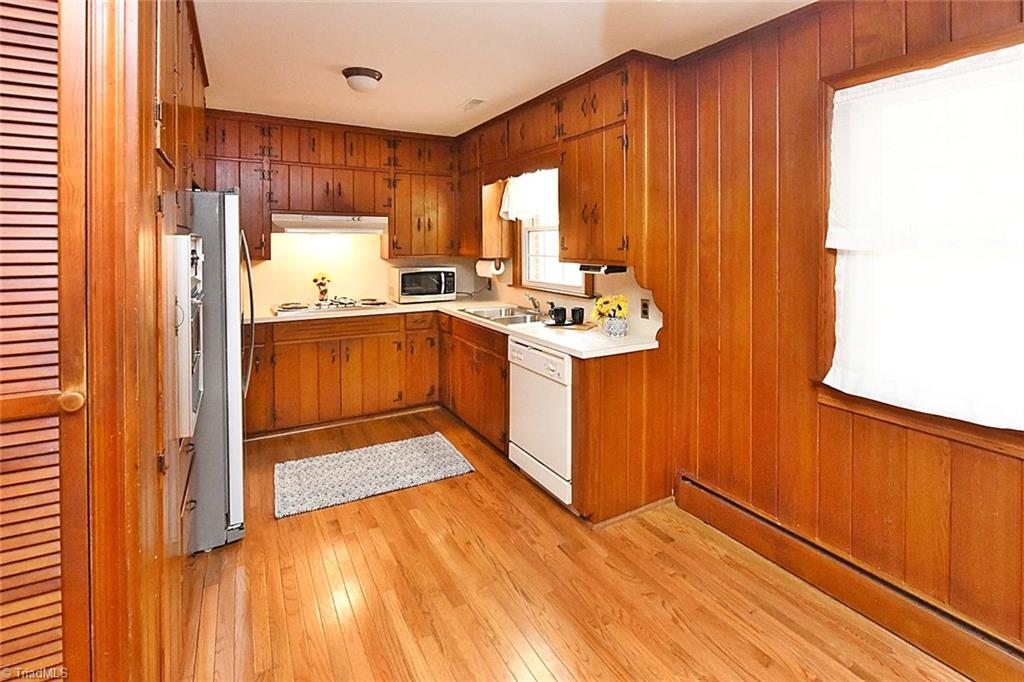 Eat-in breakfast area in kitchen would look fabulous with a farmhouse inspired light fixture