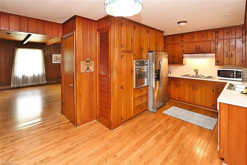 You will love the wood ceilings in this den and bright windows with the right window treatments will allow plenty of sunlight