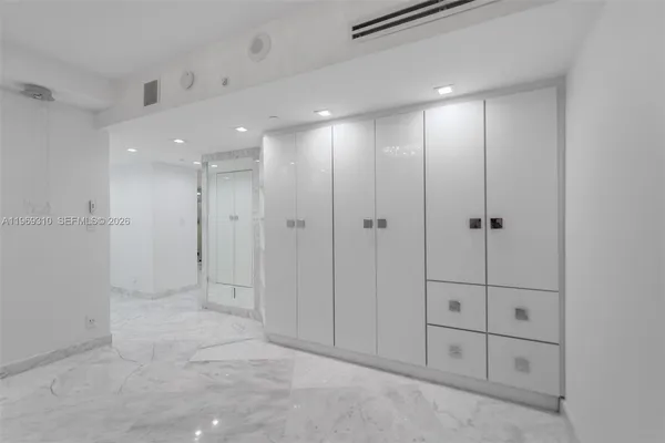 a view of a room with rack on the wall